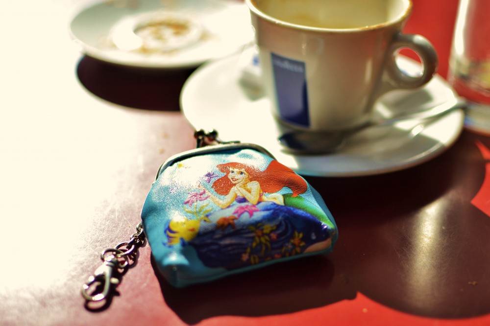 Mini wallet at breakfast in Paris