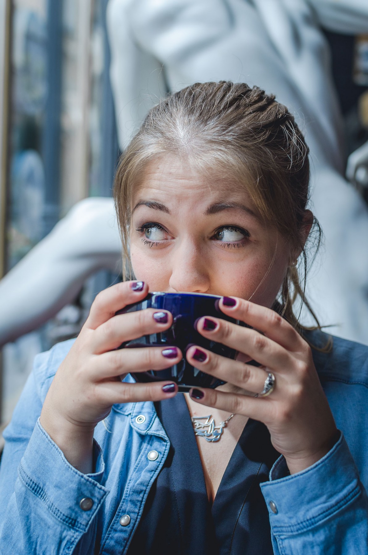 Julika drinking coffee in Luxembourg City